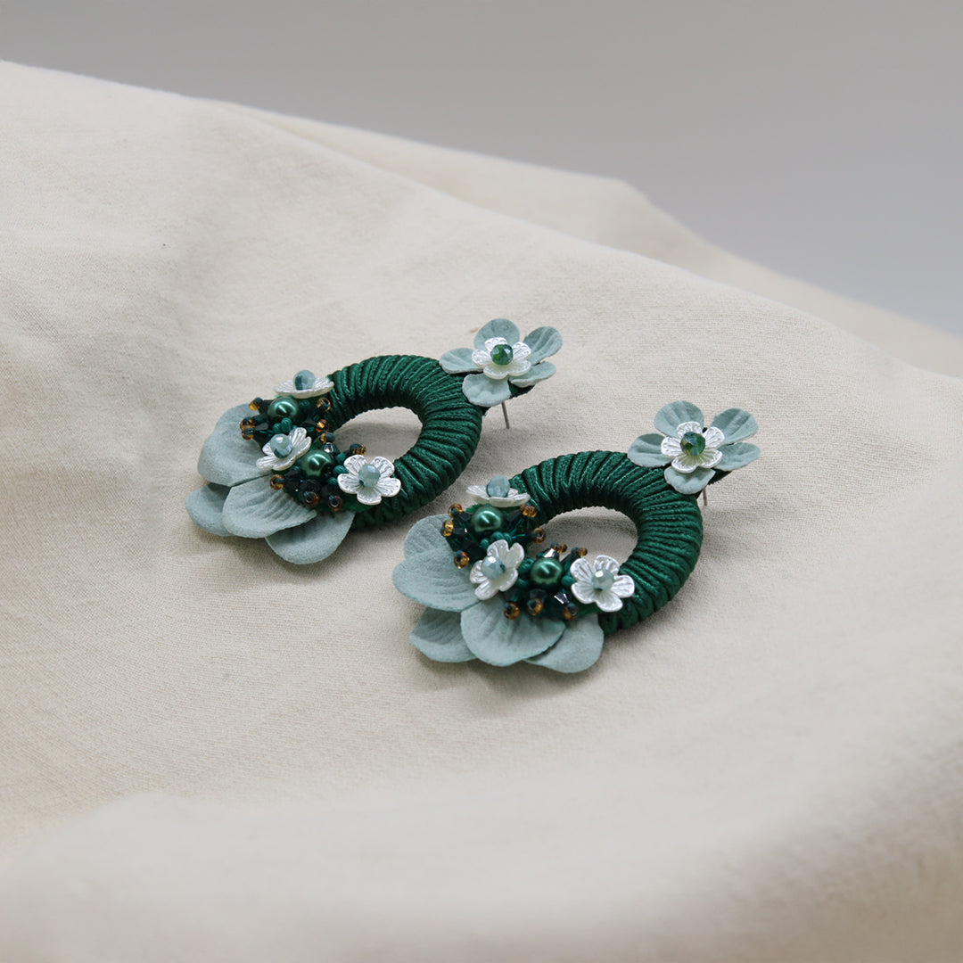 „Dora“ Ohrringe mit Harzblume und Murano